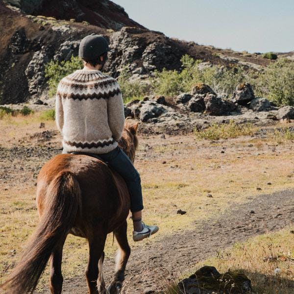 man on a horseback riding tour