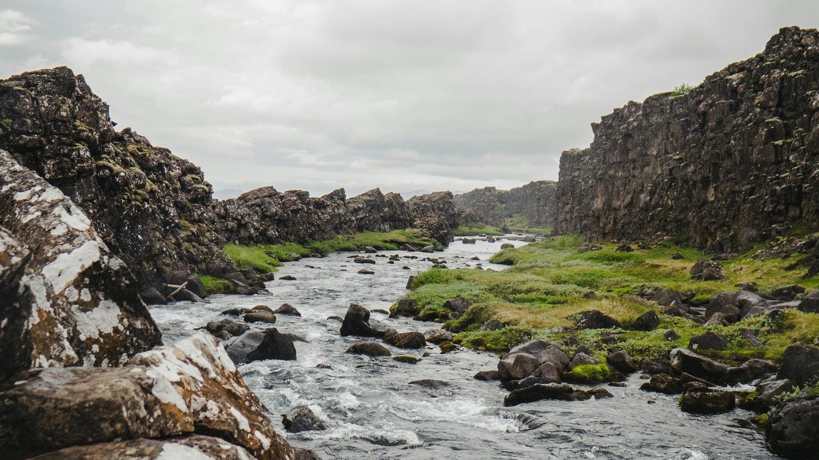 Oxara river in Thingvellir National Park, Drekkingarhylur can be seen in the distance.